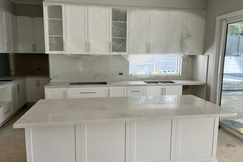 Marble-look splashback and island